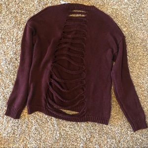 Lush burgundy sweater with cutout back